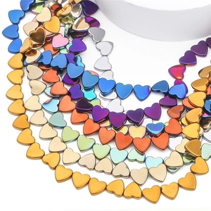 Colorful heart-shaped hematite beads with metallic electroplated finish in various vibrant colors