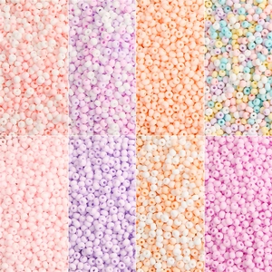 Macro view of 3mm matte macaron glass seed beads for DIY jewelry making and crafts