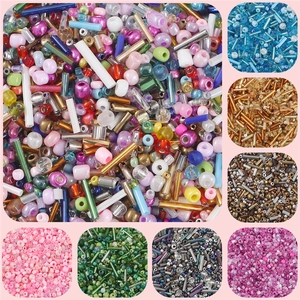 Close-up of mixed glass seed beads in multiple colors for DIY handmade jewelry crafts