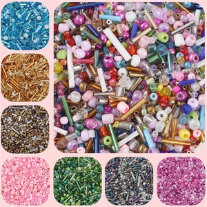 Detail view of assorted colorful DIY glass seed beads for handmade jewelry making
