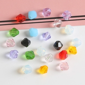 Detailed macro view of 6mm bicone crystal glass beads for DIY jewelry making and crafts