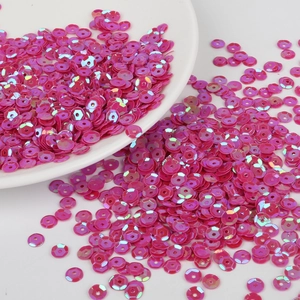 Paillettes rotonde rosa iridescenti con fori centrali per artigianato fai da te e cucito