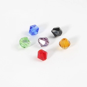 Macro shot of 4mm bicone crystal beads in multiple colors for DIY jewelry making
