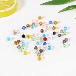 Close-up of colorful 4mm bicone crystal beads for DIY jewelry making and beadwork