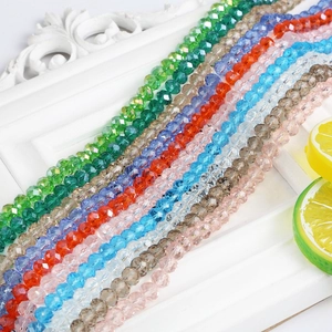 Macro shot of 8mm faceted crystal glass beads in vibrant colors for DIY jewelry making