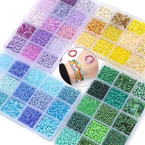Detail of 24-compartment storage boxes with colorful glass seed beads for DIY jewelry making