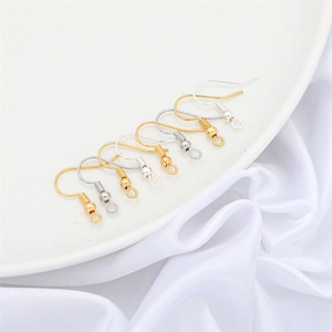 Polished gold and silver DIY earring hooks with decorative beads and wire coils