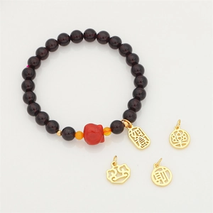14K gold plated red garnet bead bracelet with carved fox and hollow lucky charms