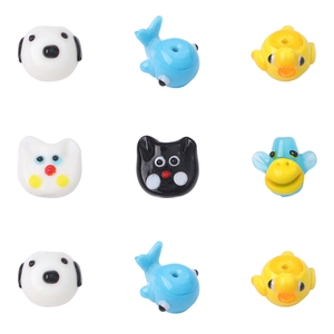 Handmade assorted glass animal beads featuring whales, ducks and cats for DIY jewelry