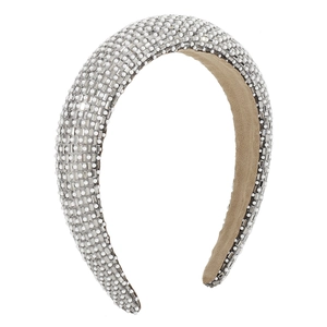 Elegant padded headband with white pearls and rectangular rhinestones on white background