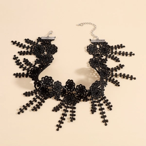 Gothic black lace choker necklace with intricate floral patterns and feather fringe