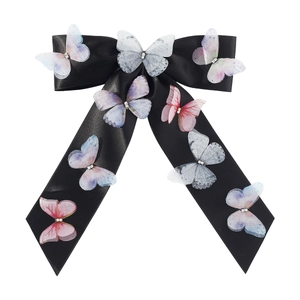 Elegant black satin hair clip with colorful mesh butterflies and sparkling crystal accents