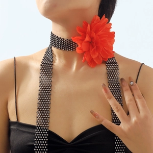 Gothic floral choker with black rhinestone mesh chain and vibrant red rose flower
