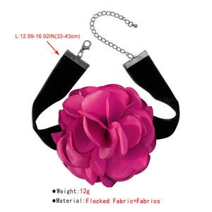 Detail of pink fabric flower choker with black flocking band and adjustable metal clasp