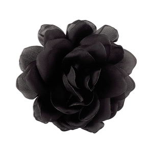 Macro detail of the multilayered black fabric rose petals with a silky finish