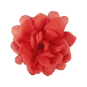 Detail of red fabric rose brooch showing layered chiffon petals and fine edge stitching