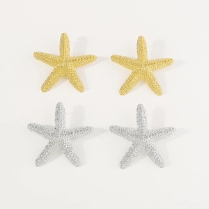 Ensemble détaillé de boucles d'oreilles étoile de mer dorées et argentées mates