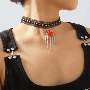 Gothic Halloween choker featuring black lace, silver studs and a skull hand holding a red rose