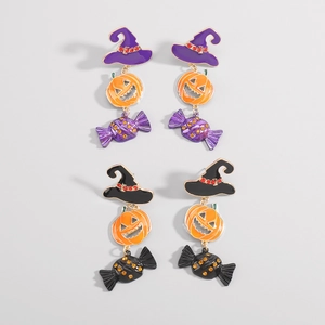 Dettaglio orecchini di zucca Halloween con smalto a goccia e cristalli arancioni