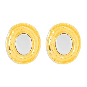 Exaggerated oval metal stud earrings with golden hammered texture and silver mirror finish