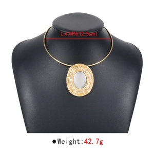 Minimalist gold tone choker necklace with grey oval pendant showing 4.9 inch diameter