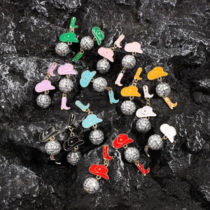 Asymmetric Western cowboy earrings with enamel hats, disco balls, and boots charms