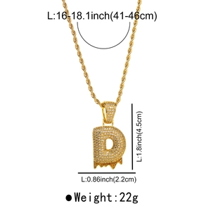 Detail of hip-hop gold D letter pendant with rhinestones showing size measurements