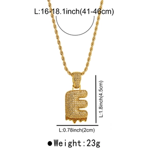 Detailed view of gold lava letter E pendant necklace with weight and size specifications