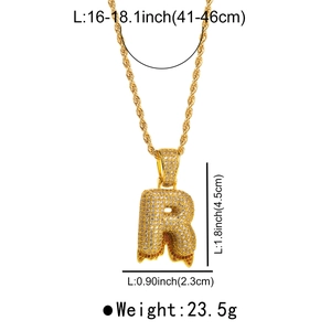 Detail of hip hop bubble letter R pendant with orange zircons and rope chain necklace