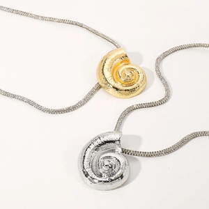 Exaggerated conch shell pendant necklace with shiny textured chain in gold and silver
