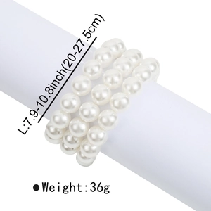 Detailed view of four-layer faux pearl bracelet showing 20-27.5cm length and 36g weight