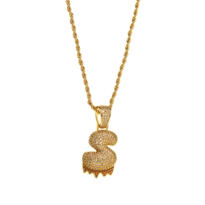 Detail of hip hop S-letter pendant with dripping orange gemstone and rope chain