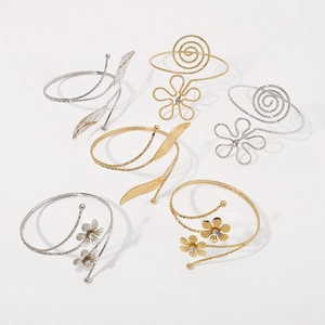 Adjustable metal upper arm cuffs with flower leaf designs in gold and silver finish