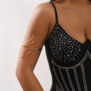 Golden multi-layer snake arm cuff with spherical tips on adjustable open metal band