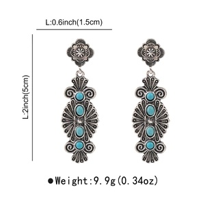 Detail showing dimensions of vintage silver bohemian earrings with turquoise stones