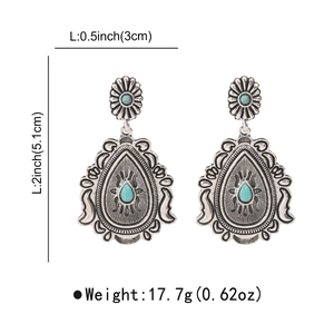 Detail view showing dimensions of vintage bohemian earrings with turquoise stones