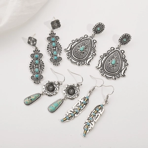 Vintage bohemian earrings set with turquoise stones in antique silver finish