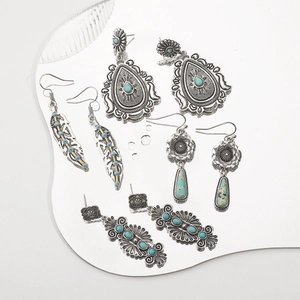 Vintage bohemian turquoise earring set with engraved silver finish and ethnic designs
