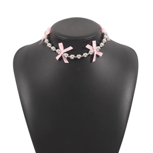 Y2K beaded choker necklace with silver metal beads and pink ribbon bow details