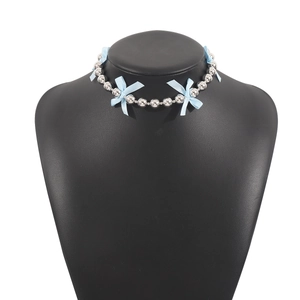 Silver beaded choker featuring delicate light blue ribbon bows in a Y2K aesthetic style