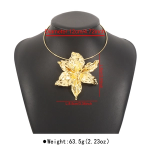 Detailed view of large gold flower pendant necklace with dimensions and hammered texture