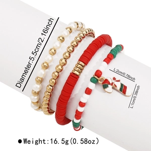 Detail view of 4pcs Christmas beaded bracelets set with candy cane charm and festive colors