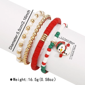 Detail shot of a 4-piece Christmas bead bracelet set featuring a snowman pendant charm