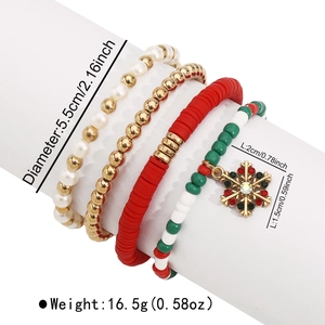 Detailed view of Christmas charm bracelets with snowflake pendant and bead textures
