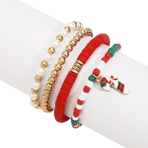 Close-up of four-piece Christmas charm bracelet set featuring candy cane pendant
