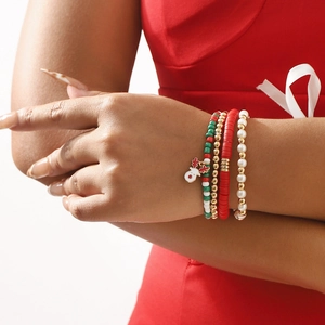 Christmas beaded bracelet set with reindeer pendant and adjustable festive charms