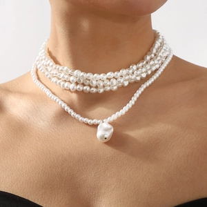 Elegant multi-layer pearl necklace set with baroque pearl pendant on female model