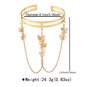Detailed view of gold butterfly tassel arm cuff with 8.1cm diameter and size measurements