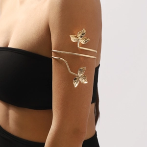 Elegant gold leaf spiral upper arm cuff featuring intricate leaf details and rope textures