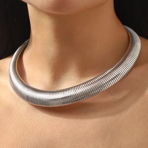 Chunky silver snake bone choker with heavy metal geometric texture for women